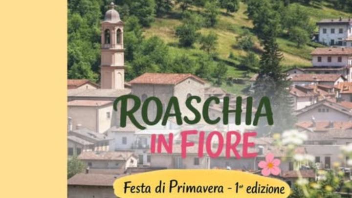 Veduta fotografica del borgo alpino di Roaschia e scritta