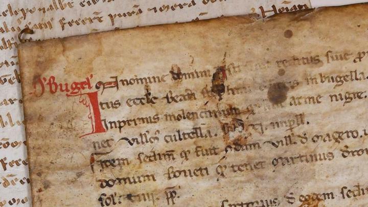 Particolare di documenti medievali manoscritti con attestazione di Bugella, antica Biella Particolare di documenti medievali manoscritti con attestazione di Bugella, antica Biella